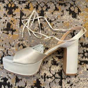 Brand new lulus, ivory block heels with tie up. Size 7.